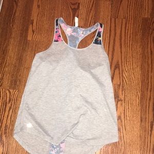 A tank top with a colorful stripe